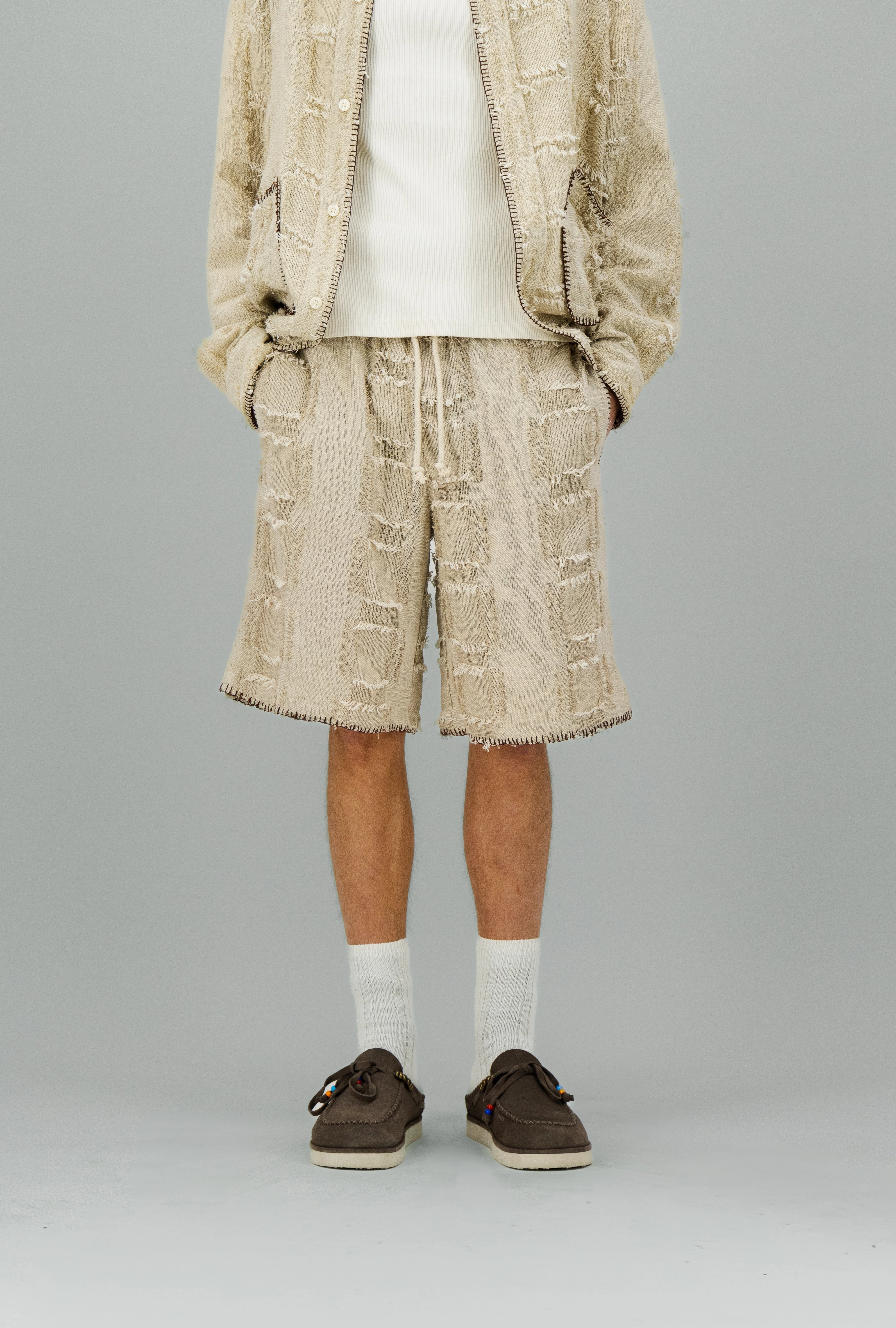 Short écru à détails fantaisie