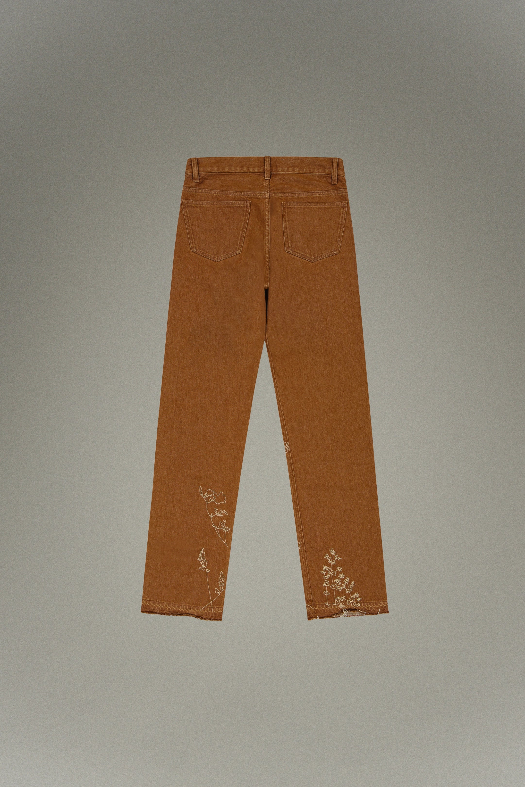 Washed effect jeans with floral embroidery