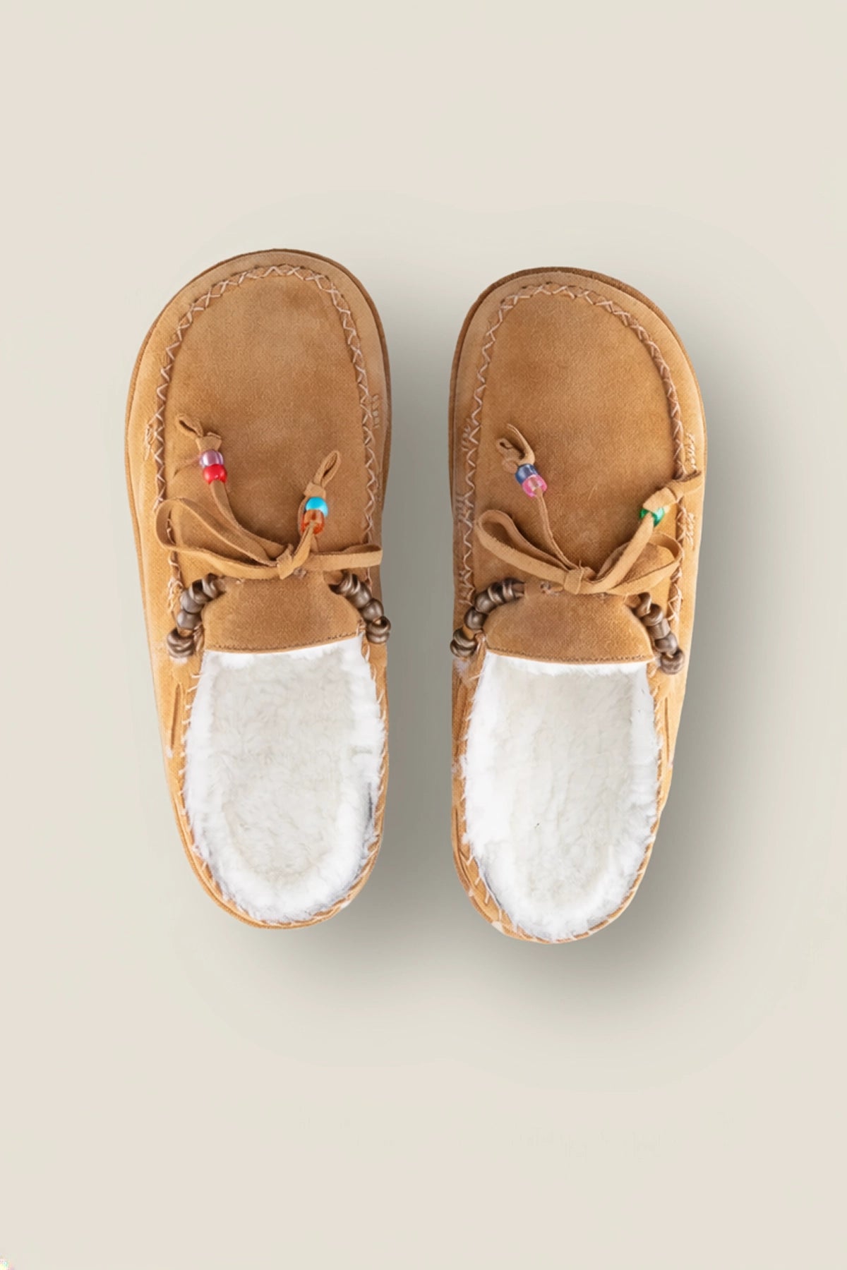 Mules fourrées brodées