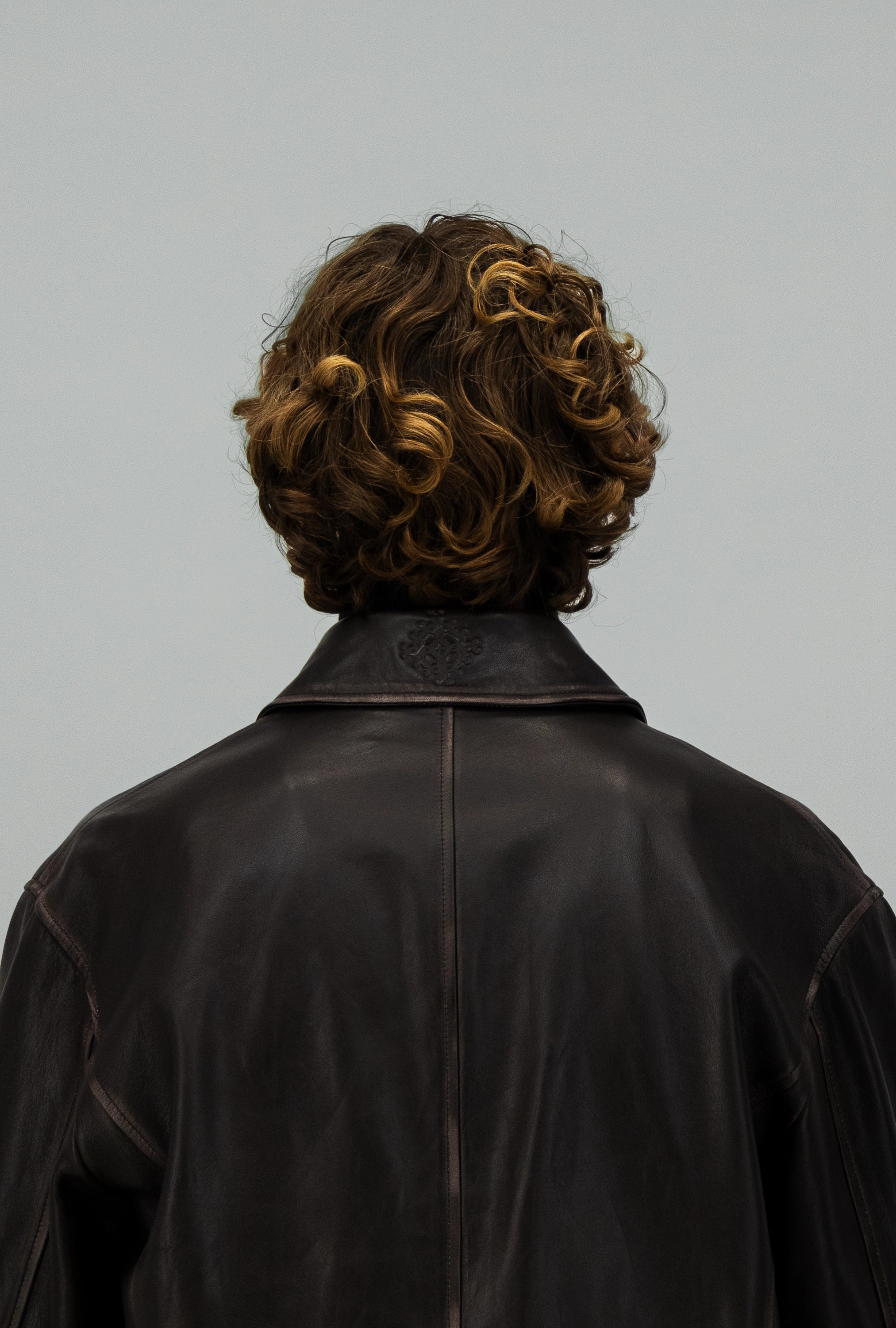 Veste en cuir aux bords délavés